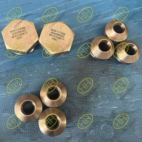 ASTM A350 LF2 MSS SP-97 butt weld branch outlets and A105N galvanized ASME B16.11 threaded hex plugs